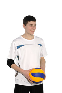 Volleyball player with the ball on a white background