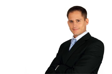 Portrait of a handsome young businessman with arms crossed