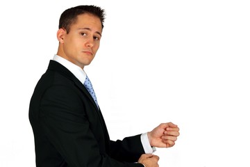 Young handsome business man trying a new suit