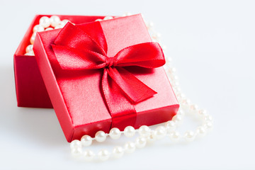 gift with beads in the red packing