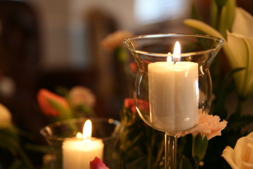 candle flame in wedding arrangement in a home