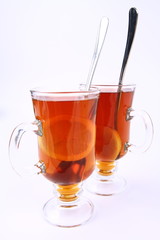 Two glasses of tea with lemon