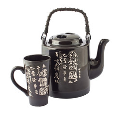 The black chinese teapot and cup on white background
