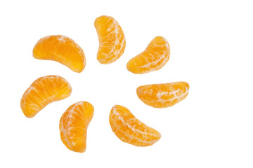 Mandarin citrus fruit segments isolated over white background.