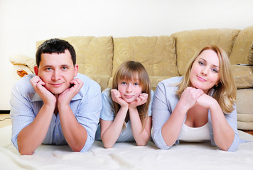 Young married couple and their daughter