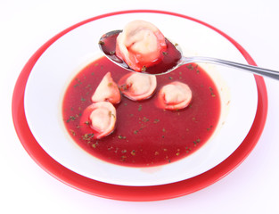 Polish Christmas Eve dish:clear borscht with dumplings (uszka)