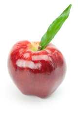red apple with green leaf isolated on white
