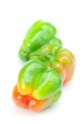 multicolored peppers isolated on white