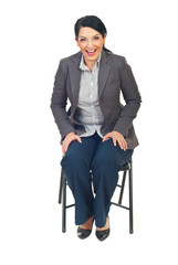 Executive woman sit on chair and laughing out loud