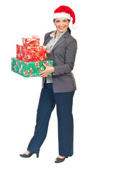 Attractive business woman with Christmas gifts