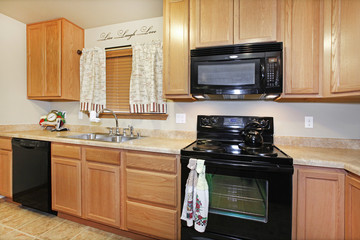 Kitchen with maple cabinets