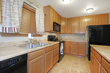 Kitchen with black appiiances