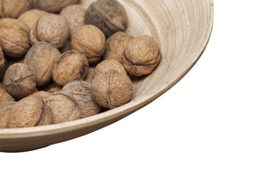 wooden bowl with walnuts