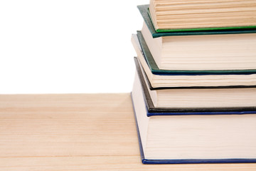 pile of old books isolated on white