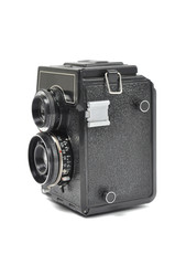 Old middle-format camera over white