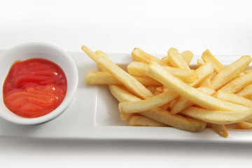 french fries with tomato and chili sauce