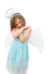 little girl dressed like angel isolated on white