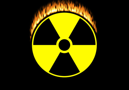 Nuclear symbol isolated on black with flames