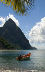 soufriere st. lucia twin piton mountain peaks with fishing boat