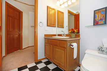 Bathroom with black and white tiles