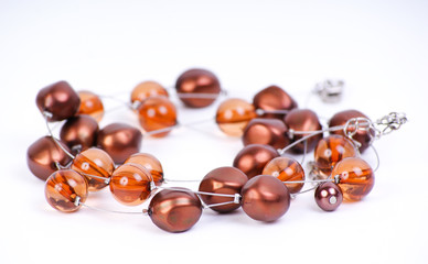 Beads lying on a white background