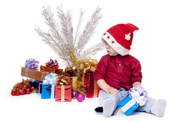 Young boy as Santa Claus isolated on white background