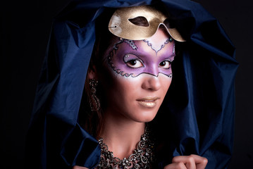 Studio portrait of a girl with art make-up