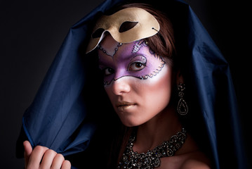 Studio portrait of a girl with art make-up