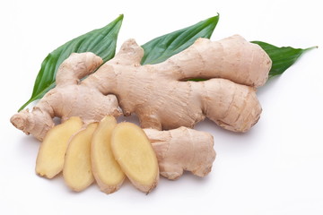 Fresh ginger with leaves isolated on white background.