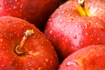 Drops of water on fresh red apples