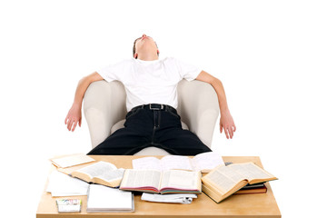 tired teenager sleeping in the armchair