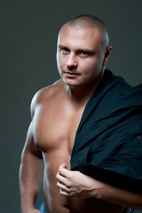 Fototapeta premium Handsome sexy young guy, studio shot