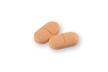 two orange medical pills