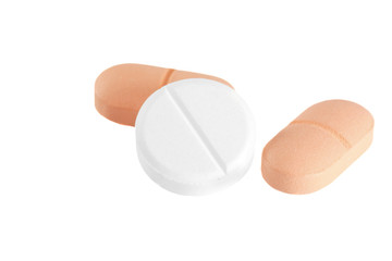 Macro shot of Three  tablets on white