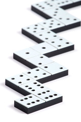 Domino pieces in a line or zigzag on white background