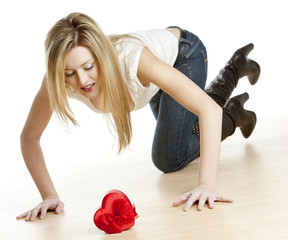 kneeling woman with heart