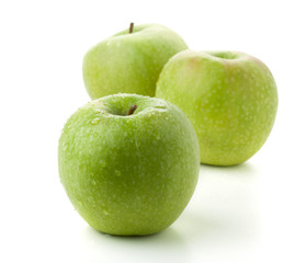 Three ripe green apples