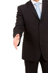 A businessman with an open hand ready to seal a deal. isolated