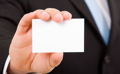 hand of businessman offering businesscard