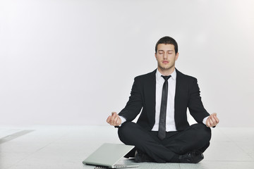 business man practice yoga at network server room
