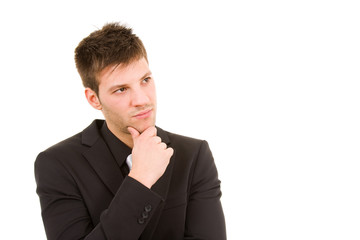 Picture of a pensive young business man in white background
