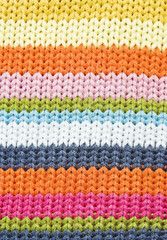 Closeup of colorful knitted wool texture.