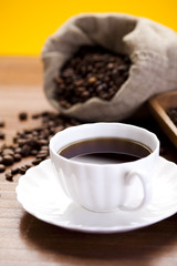 Caffee cup and beans