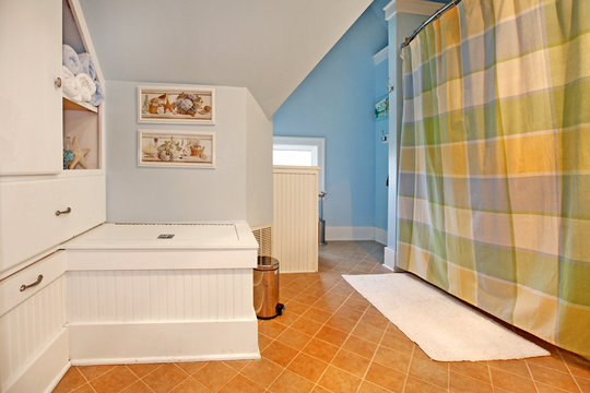 Bathroom with sitting bench