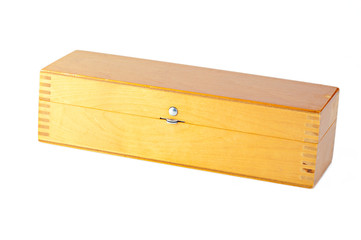 Closed wooden box isolated on a white background