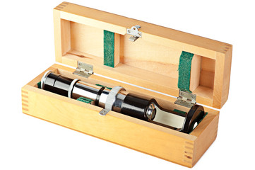 Old fashioned mini microscope in wooden box