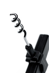Black corkscrew isolated on white