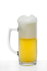 Glass of beer with froth