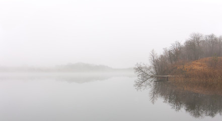 Fototapeta premium Landing stage in the foggy morning