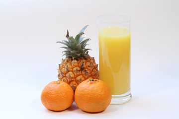 Mixed fruits with a glas of orangejuice